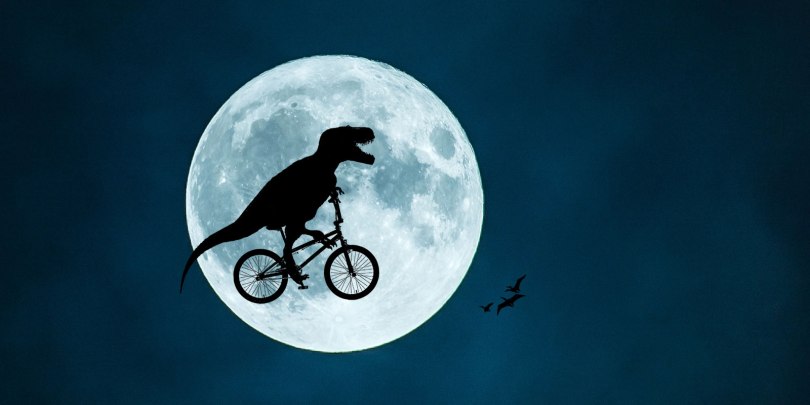 T. Rex cycling in front of the Moon